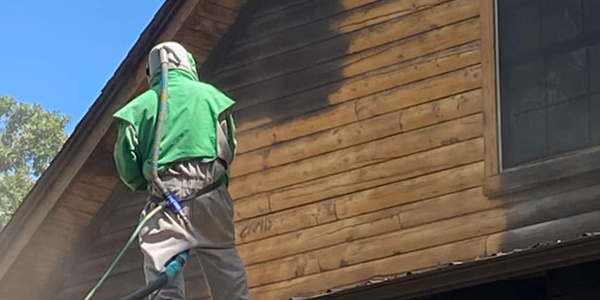 blasting log home _ compressed